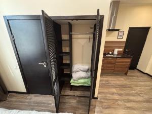 Kuchyň nebo kuchyňský kout v ubytování ApartHotel Riga