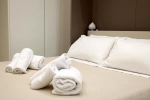 Postel nebo postele na pokoji v ubytování Parva Domus Bari