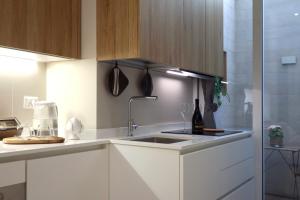 Kuchyň nebo kuchyňský kout v ubytování Parva Domus Bari