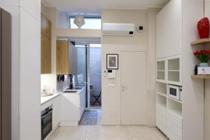 Kuchyň nebo kuchyňský kout v ubytování Parva Domus Bari + 37 fotografií