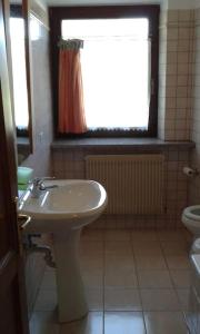 Koupelna v ubytování Chalet Rustico Bertolini per Gruppi!