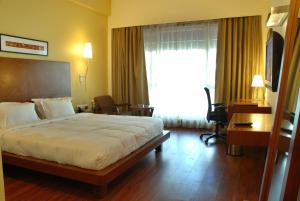 Ein Bett oder Betten in einem Zimmer der Unterkunft The Sky Imperial, Jaipur
