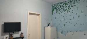 Et tv og/eller underholdning på CASA PRAIA PERUÍBE PISCINA