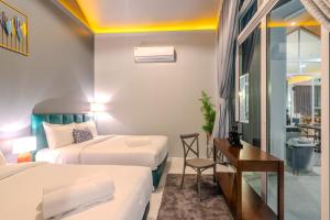 Postel nebo postele na pokoji v ubytování BellaBella Private Pool Villa Hua Hin