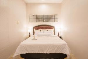 Giường trong phòng chung tại CBD Studio1 Next to Sun Plaza City Center!