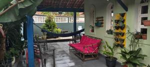 En balkon eller terrasse på CASA PRAIA PERUÍBE PISCINA