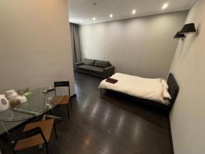 Postel nebo postele na pokoji v ubytování ApartHotel Riga