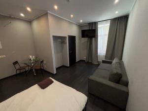 Postel nebo postele na pokoji v ubytování ApartHotel Riga