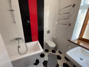 Koupelna v ubytování ApartHotel Riga