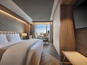 Postel nebo postele na pokoji v ubytování The Westin Madrid Cuzco + 37 fotografií