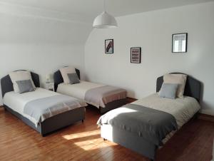 Postel nebo postele na pokoji v ubytování Chambre 4 Iris