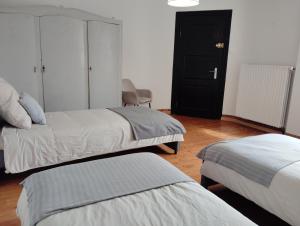 Postel nebo postele na pokoji v ubytování Chambre 4 Iris