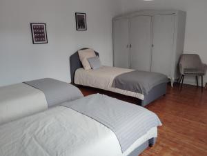 Postel nebo postele na pokoji v ubytování Chambre 4 Iris