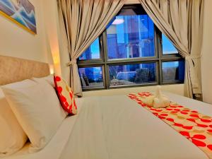 Agile Delima Residensi Bukit Bintangにあるベッド