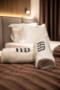 Voodi või voodid majutusasutuse Dial Hotel toas