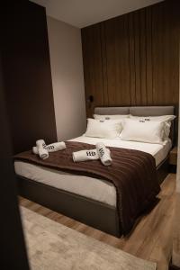 Voodi või voodid majutusasutuse Dial Hotel toas