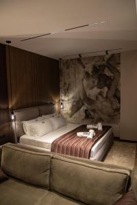 Voodi või voodid majutusasutuse Dial Hotel toas