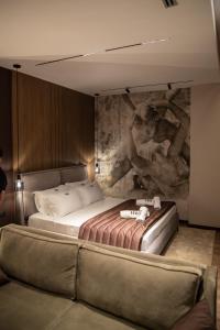 Voodi või voodid majutusasutuse Dial Hotel toas