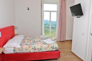 Postel nebo postele na pokoji v ubytování Antares Rooms