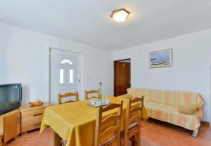 TV a/nebo společenská místnost v ubytování Apartment Kosta
