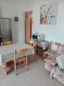 Kuchyň nebo kuchyňský kout v ubytování Apartment Kosta