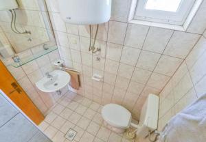 Koupelna v ubytování Apartment Kosta
