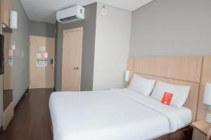 Postel nebo postele na pokoji v ubytování ibis Medellin