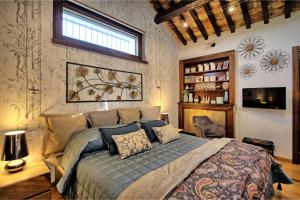 a bedroom with a large bed in a room at Villa Tagliaferri by PosarelliVillas in Vasto +44 photos