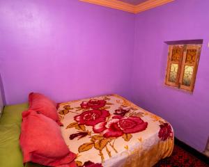 Uma cama ou camas num quarto em Gite Tamounte