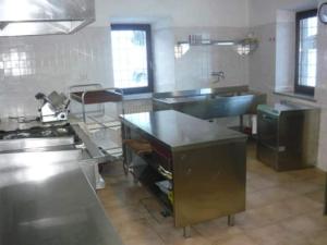Kuchyň nebo kuchyňský kout v ubytování Chalet Rustico Bertolini per Gruppi!