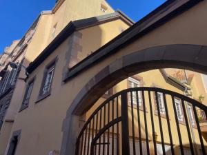 an entrance to a building with an iron gate at LE PIERRE 2 CH 2 SDB 1 parking in Strasbourg
