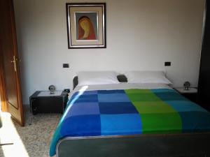 A bed or beds in a room at Villa Celeste