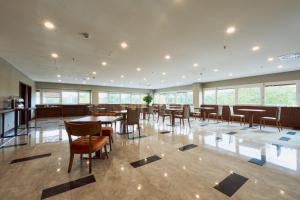 Posezení v ubytování Puzzle Hotel Airport Frankfurt