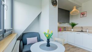 Kuchyňa alebo kuchynka v ubytovaní VacationClub - Koło Brzegu Apartament 54