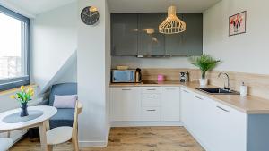 Kuchyňa alebo kuchynka v ubytovaní VacationClub - Koło Brzegu Apartament 54
