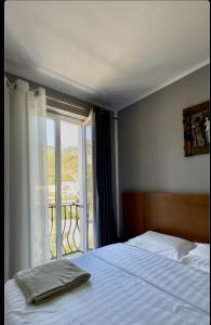 Postel nebo postele na pokoji v ubytování Hotel Rubin