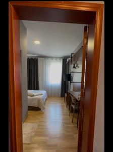 Postel nebo postele na pokoji v ubytování Hotel Rubin