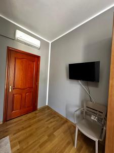 TV a/nebo společenská místnost v ubytování Hotel Rubin