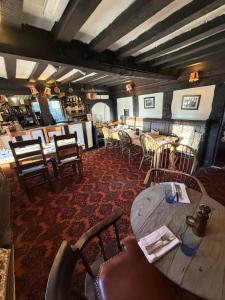 a dining room with a table and chairs at Rhydspence in Hay-on-Wye