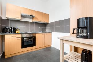 Η κουζίνα ή μικρή κουζίνα στο Work & Enjoy Your Stay +36 φωτογραφίες