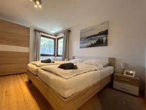 Postel nebo postele na pokoji v ubytování Haus Waldblick