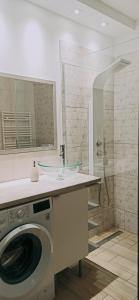 Koupelna v ubytování Apartament Eveline z garażem + 2 fotografie