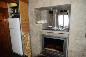 Η κουζίνα ή μικρή κουζίνα στο Chalet d' Egloo 10-12 pers