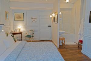 Guest House Saint Yves客房内的一张或多张床位