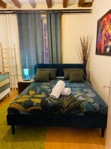 Postel nebo postele na pokoji v ubytování Montreux centre magnifique appartement avec terrasse + 7 fotografií