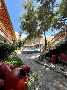 Um jardim em Hotel El Huacachinero