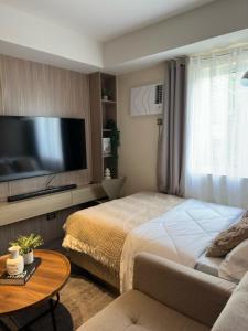 Una cama o camas en una habitación de El Suite