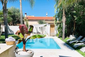 Bazén v ubytování Villa mer et plage à 50 m piscine proche centre nebo v jeho okolí