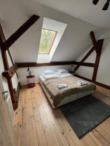 Postel nebo postele na pokoji v ubytování Várkerület 6 Apartman