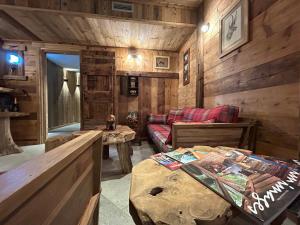 Posezení v ubytování HIBOU Chambres - Cogne